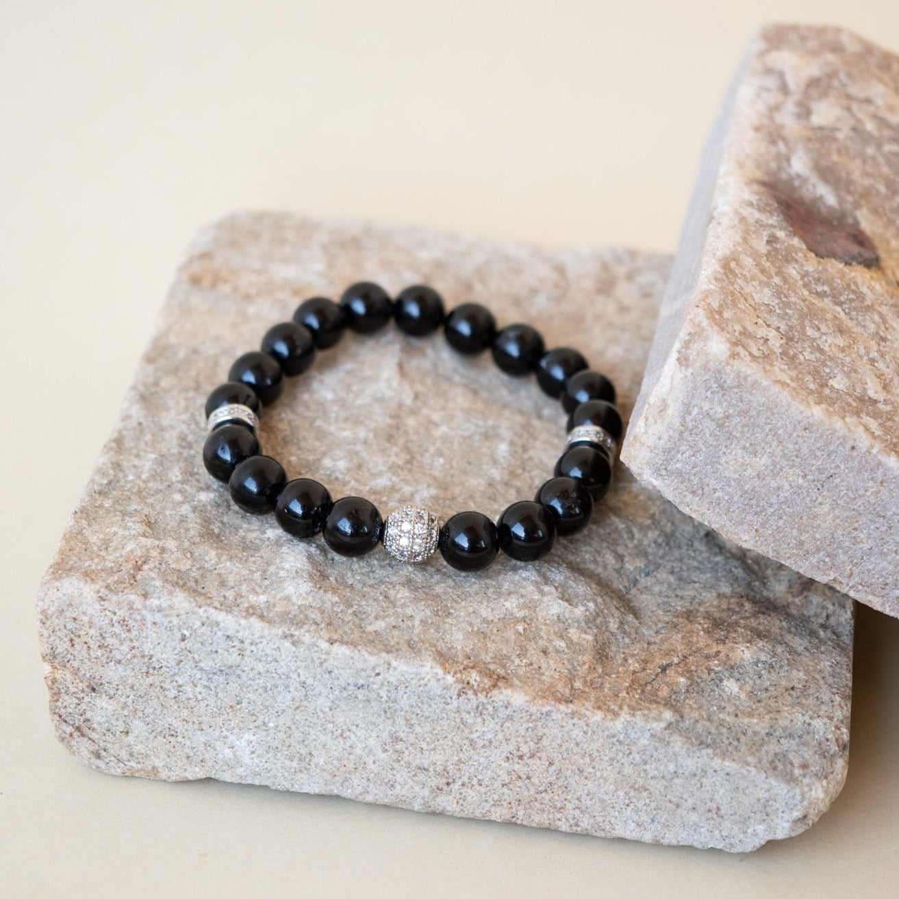 Black Natural Agate bracelet - Indulge in luxury with our Black Natural Agate bracelet. Crafted with genuine agate, this bracelet exudes sophistication and elegance. Adorn your wrist with the beauty of nature and feel the grounding energy of agate. A must