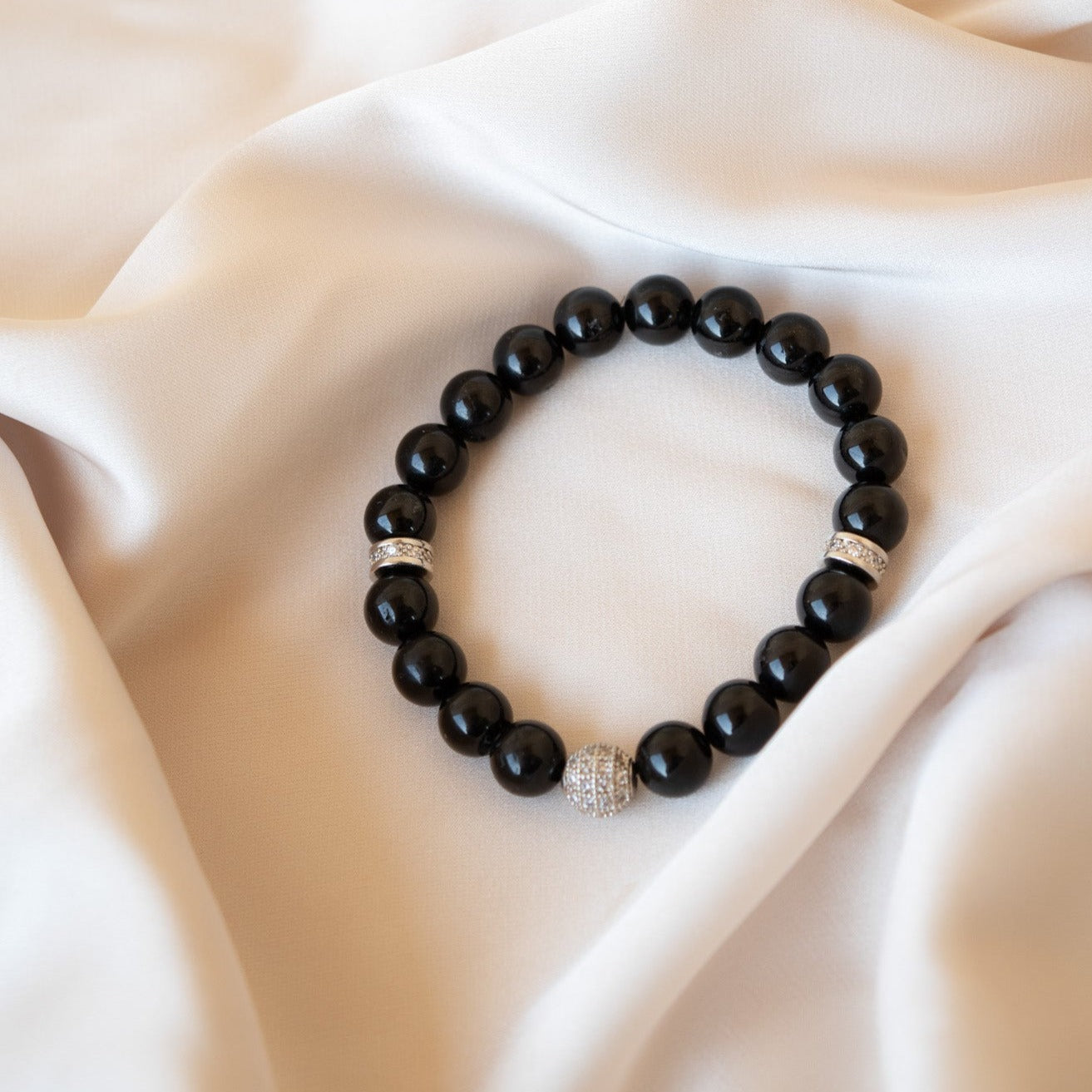 Black Natural Agate bracelet - Indulge in luxury with our Black Natural Agate bracelet. Crafted with genuine agate, this bracelet exudes sophistication and elegance. Adorn your wrist with the beauty of nature and feel the grounding energy of agate. A must