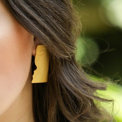 Elevate your style with Faces Earrings from GAIA Global. Luxury and durability in 18K gold-plated stainless steel for a timeless addition.