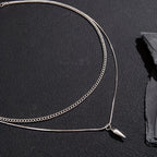 Men's Stainless Steel Double Layer Necklace Necklace with sleek conical pendant for a modern, hip-hop style.
