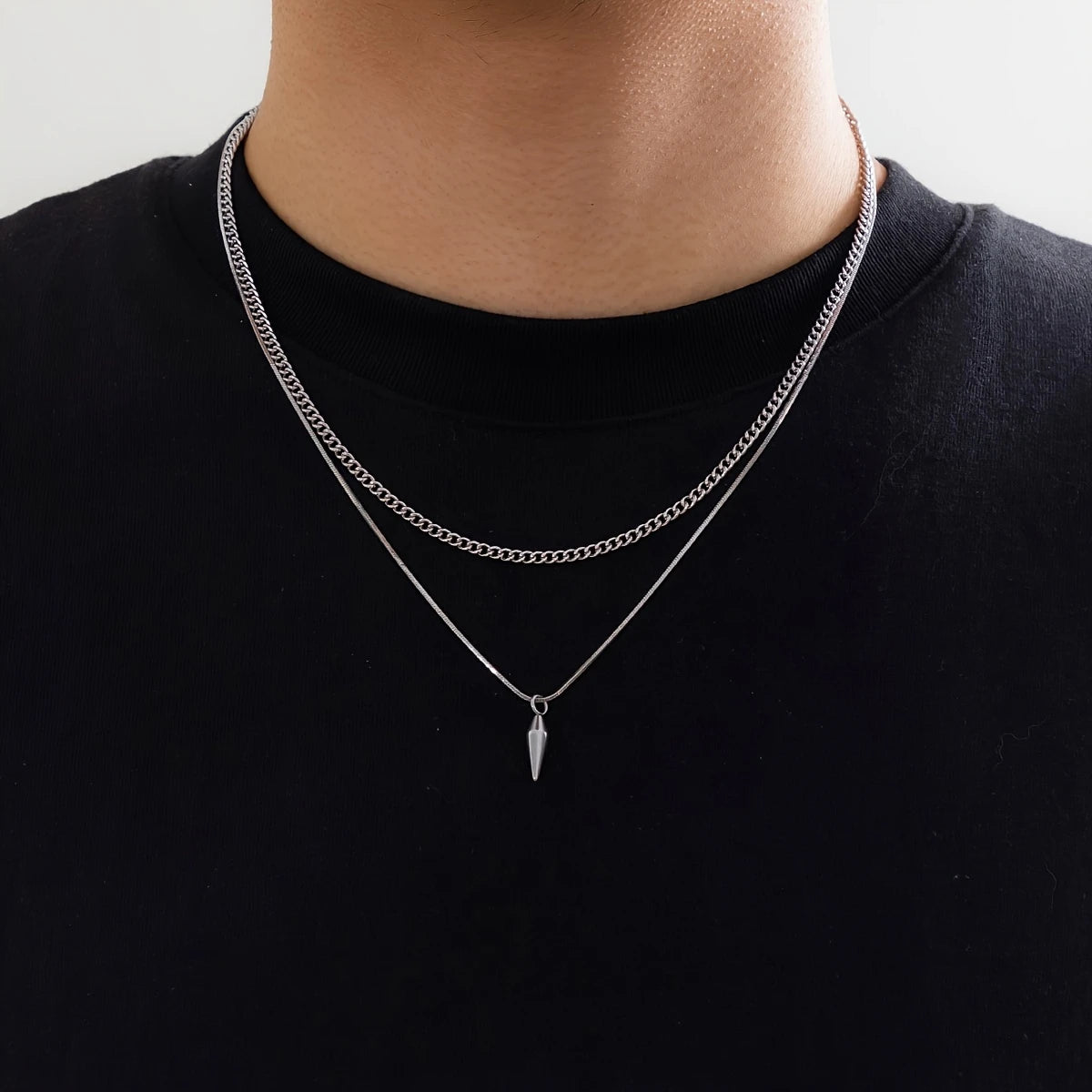 Men's Stainless Steel Double Layer Necklace Necklace adds minimalist hip-hop flair to any casual look.